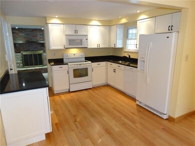 Gorgeous hardwood floors through this spacious eat