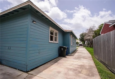 View of property exterior featuring a patio