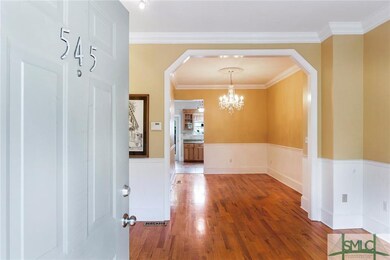Open and bright floor plan with high ceilings .
