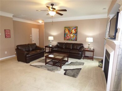 Another view of the living room.  Open to kitchen 