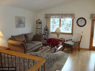 Spacious and bright living room with laminate floo