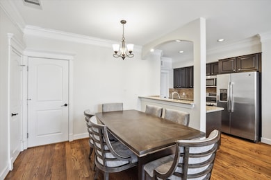The kitchen is open to the dining room.