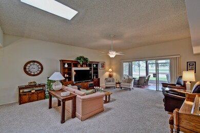 LIVING ROOM WITH LARGE SKY LIGHT