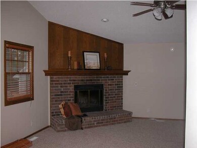 Main floor living room with vaulted ceiling