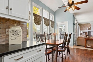 Large Eating Area & Bright Wall of Windows