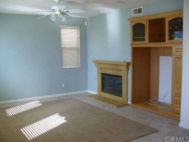 Family Room features enterainment center and gas f