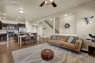 Living room, open concept main level with engineered wood flooring