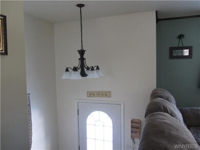 Foyer. NEW LIGHT FIXTURE.