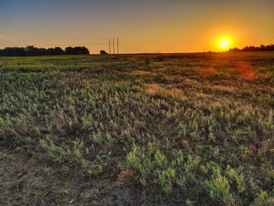 Nature at dusk featuring a rural view