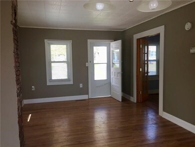 Front Entry with sitting area/formal living room.