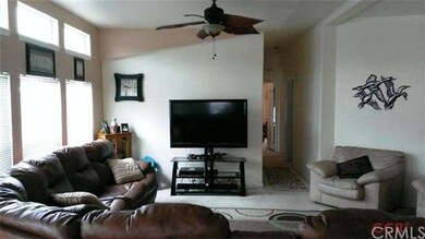 Abundant Living Room includes nice ceiling fan