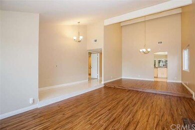Pretty tile entry way to living room and dining ro