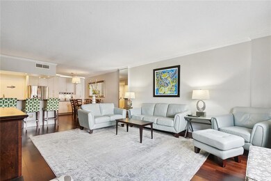 Large living room looking toward kitchen and dinin
