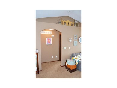 Great Room. Decorative ledge and arched doorways