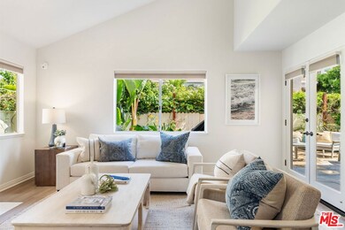 French doors from the living room lead to exterior