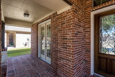 Front covered patio area. Perfect place for rockin