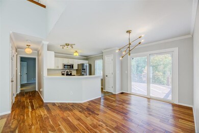 DINING ROOM AND ENTRANCE TO MAIN FLOOR MASTER SUIT
