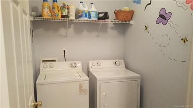 Utility Room...Washer/Dryer conveys with the prope