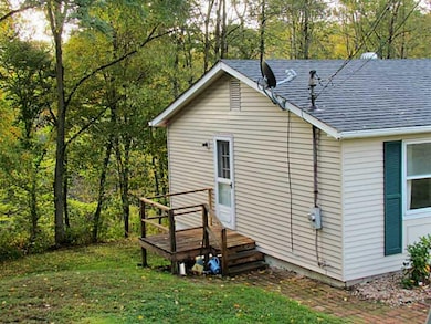Exterior Front. Nice little side porch has a view 