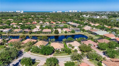 Drone / aerial view with a water view and a reside