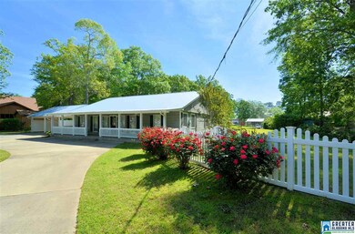 Home is landscaped in front and back