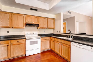 Kitchen has tray ceiling