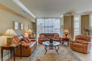 Living area featuring light tile patterned floors,