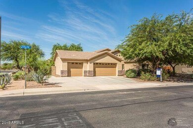 Corner lot with 3 car pull thru garage!