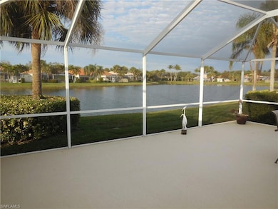 Unfurnished sunroom featuring a water view