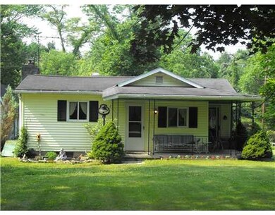 Exterior Front. Lovingly maintained home with wrap