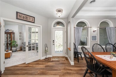 The entry elegantly flows into the living area, fo