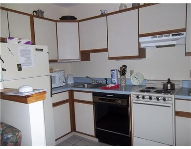 Kitchen. Kitchen has refrigerator,...