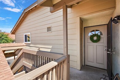 A large front deck leads you to this gorgeous home.