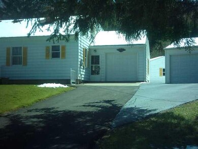 Exterior Front Driveway and one-car attached garag