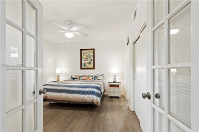 Just off the entrance is the primary bedroom with