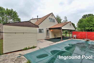 View looking onto the pool, patio & shed