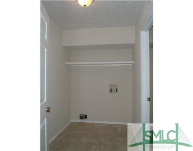 Laundry Room. A large separate laundry room is sit