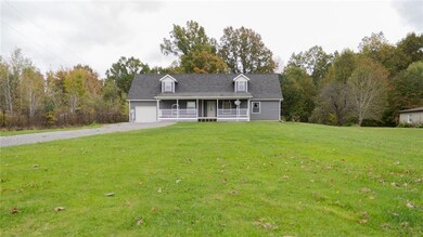 Deep front yard offers privacy.