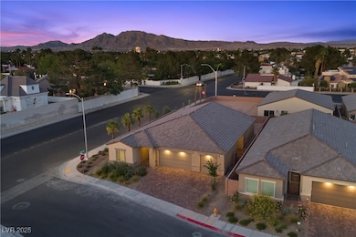 Aerial view of residential area featuring a mounta