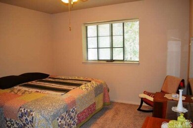 The first of two guest bedrooms, is nicely sized a
