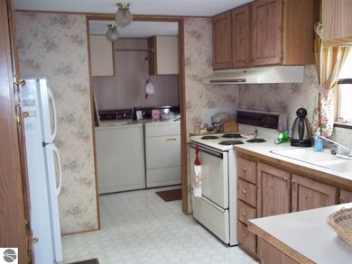 5797 Prescott Dr, Tawas City, MI 48763 - photo 4