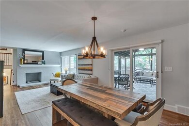 Living/dining area leads to large screen porch