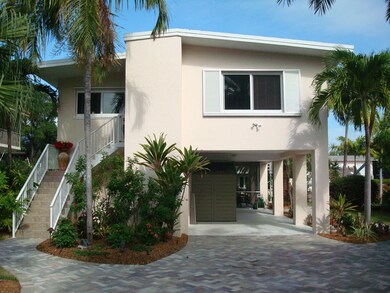 Front of House with Paved Driveway