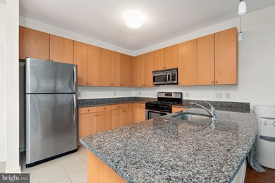 Village Lofts unit 320, Baltimore, MD 21218 - photo 2