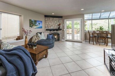 Family room looking toward the back yard. Note Fre