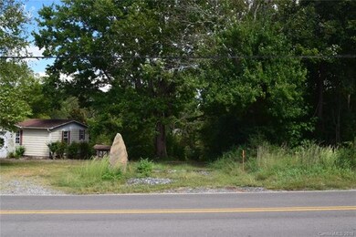 Easement road to the right of the rock leading to 