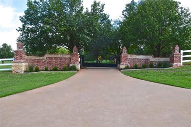 Gorgeous, brick entry including remote gate!
