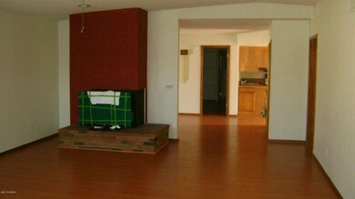 Living room w/fireplace.
