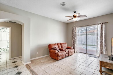 The FAMILY ROOM opens to the KITCHEN and is perfec