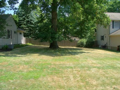 Vacant lot included in price.